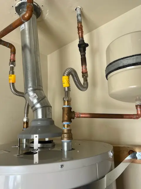 Water heater installation and plumbing repair in Fowers